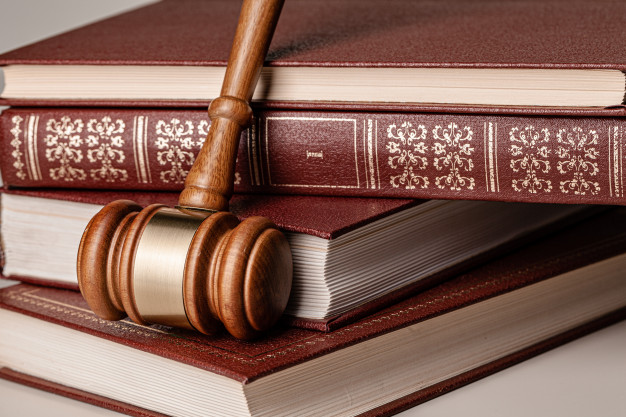 judge-gavel-legal-book-close-up-table_93675-65311